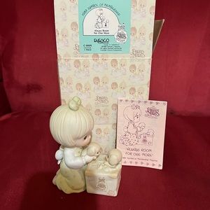 Precious Moment Always room for one more.